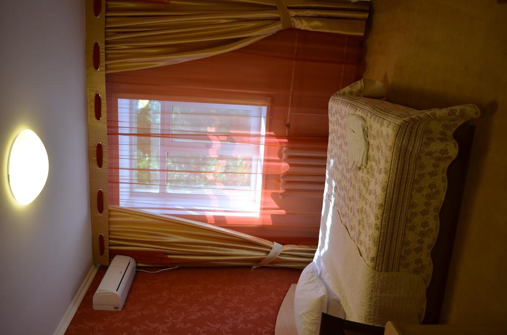 Mereke Hotel Ustʼ-Kamenogorsk Habitación foto