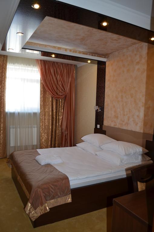 Mereke Hotel Ustʼ-Kamenogorsk Habitación foto